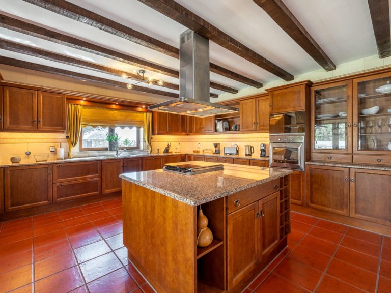 The spacious teak kitchen is a dream for every cook.