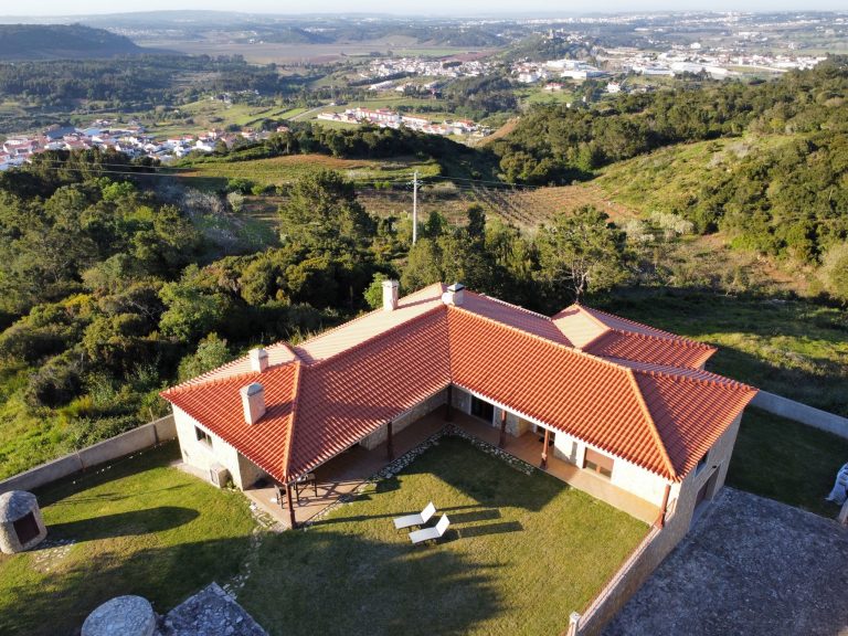An areal view on Villa Junceira show the real on the hill above Óbidos.